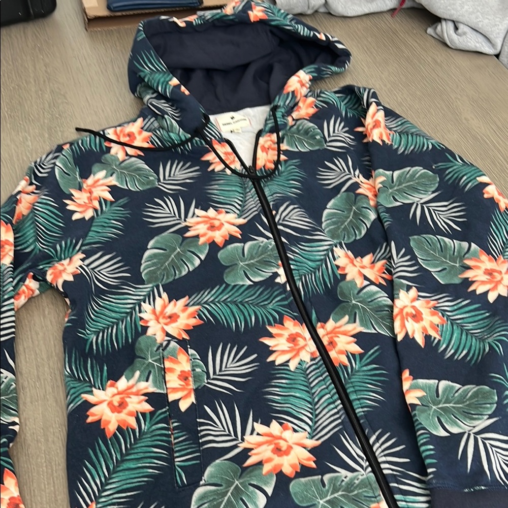 Vibrant Blue and Orange Hooded Sweatshirt with Tropical Flair